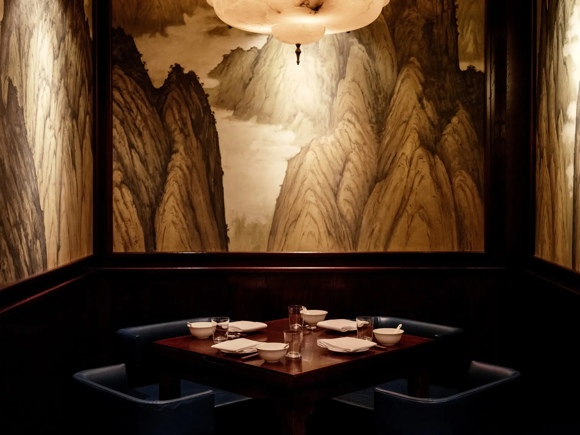 A mahogany-lined private dining room at XU in Soho