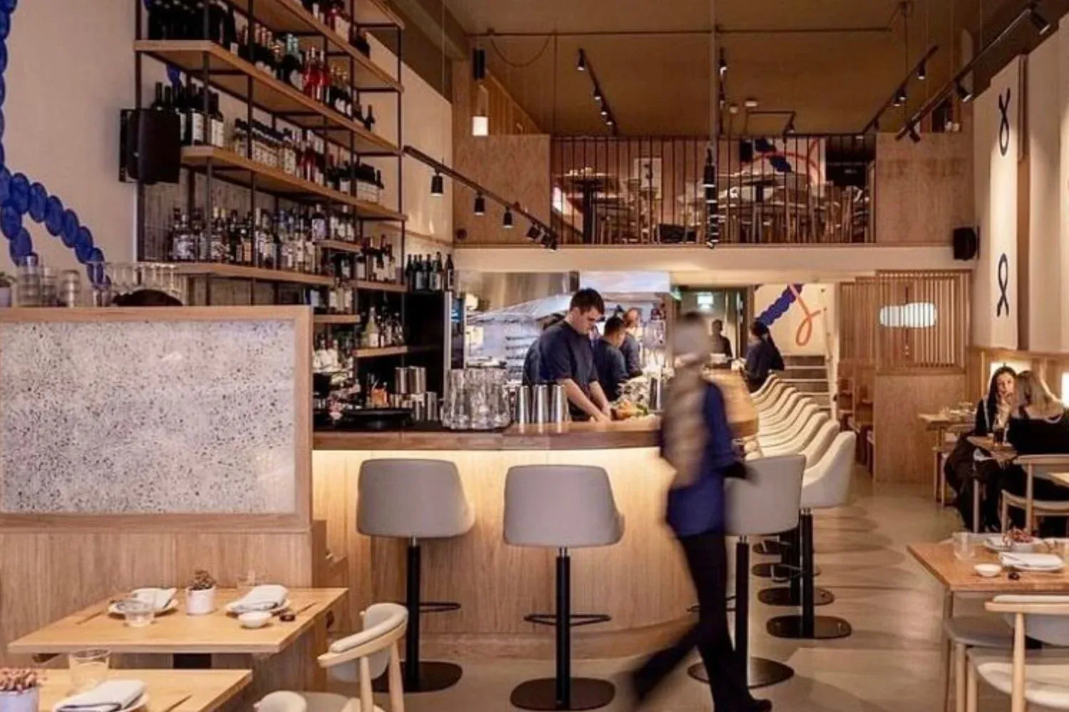 The modern Japanese dining room and bar at Kinjo