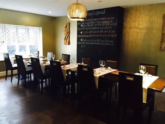 The dining room with the chef’s specials board at Regional Thai Taste